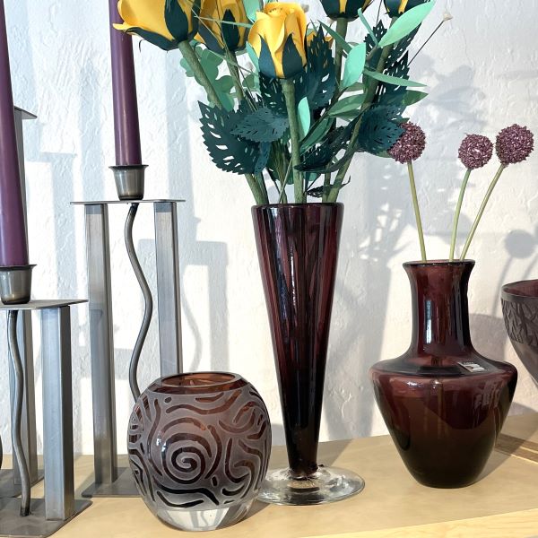 Amethyst-Blenko-vases-and-rose-bowl-vase-metal-tapered-candleholders