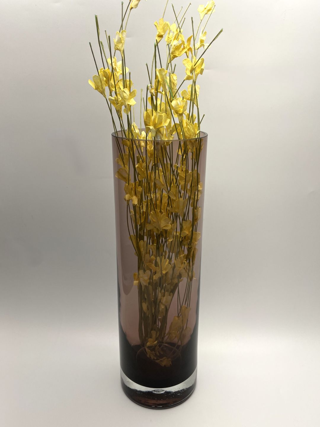 Amethyst 12 inch hand blown glass vase with flowers side view 