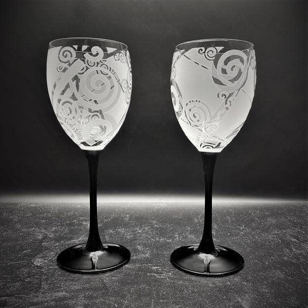 Black-stem-luminarc-domino-wine-glasses-with-sandblasted-spiraling-out-of-control-design