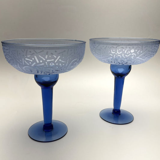 Blue Mexican blown glass margaritas with sandblasted designs side view 