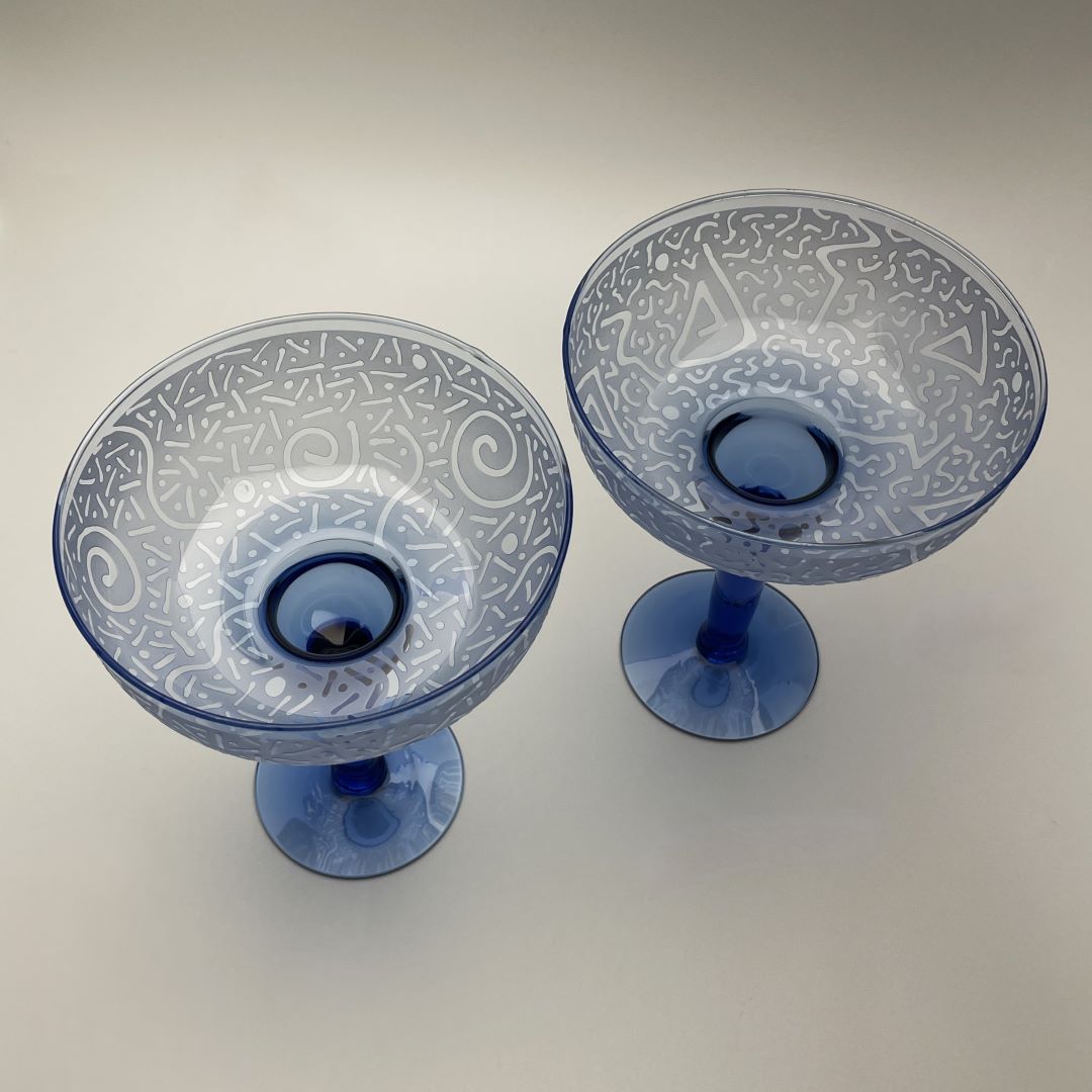 Blue Mexican blown glass margaritas with sandblasted designs top view 