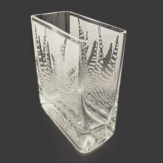 Clear rectangular blown glass vase with sandblasted aloe design angled view 