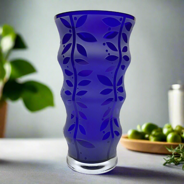 Cobalt blue ribbed glass vase with Leaf it to you design  side view