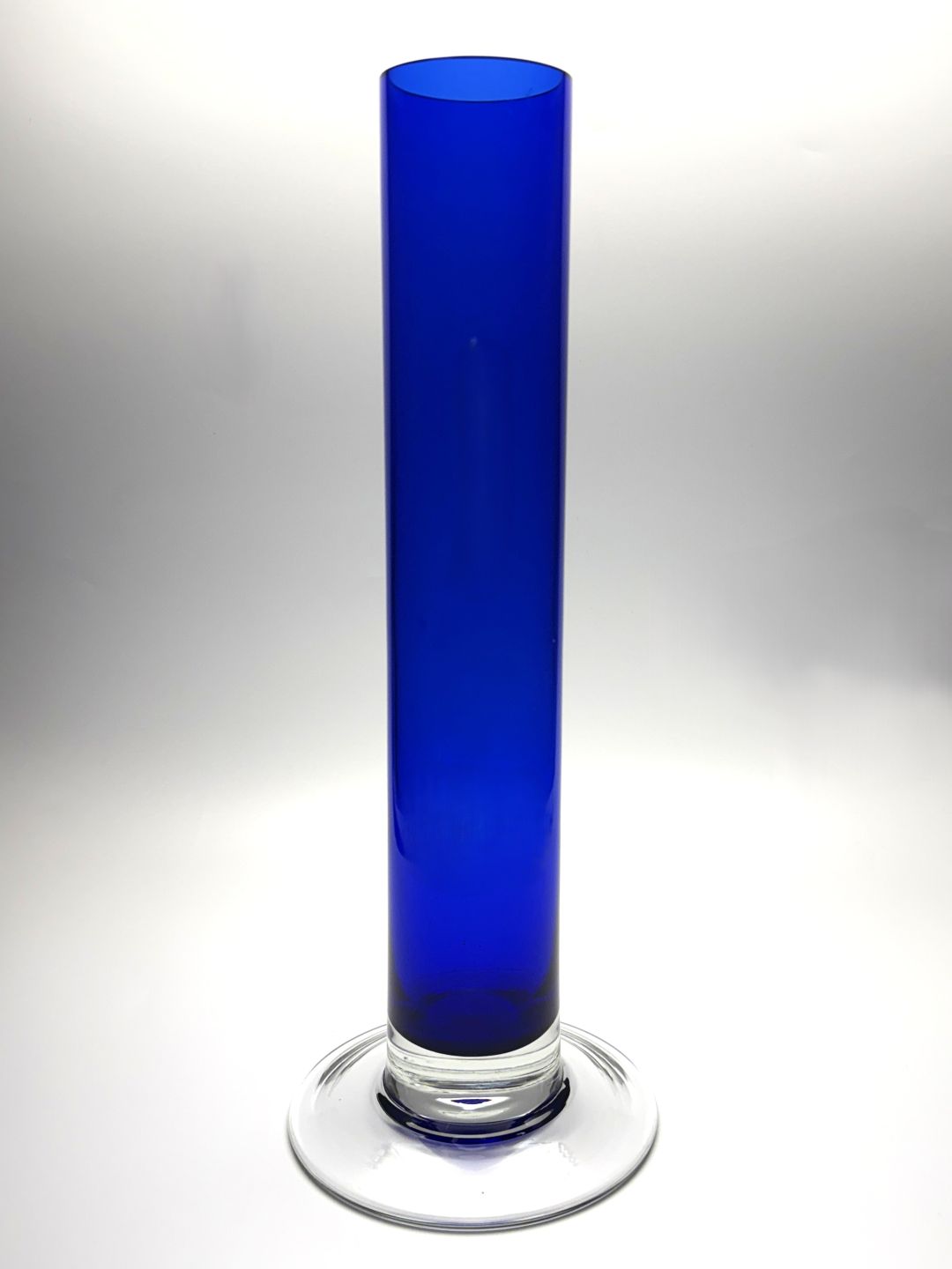 Cobalt blue tall footed cylinder hand blown glass vase