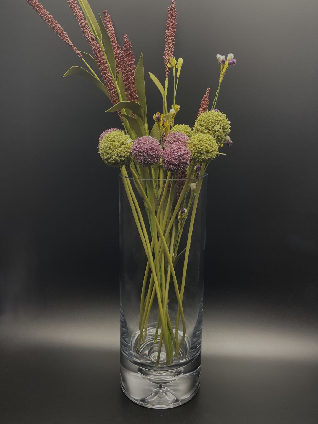 Crystal vase with bubble in the base with flowers