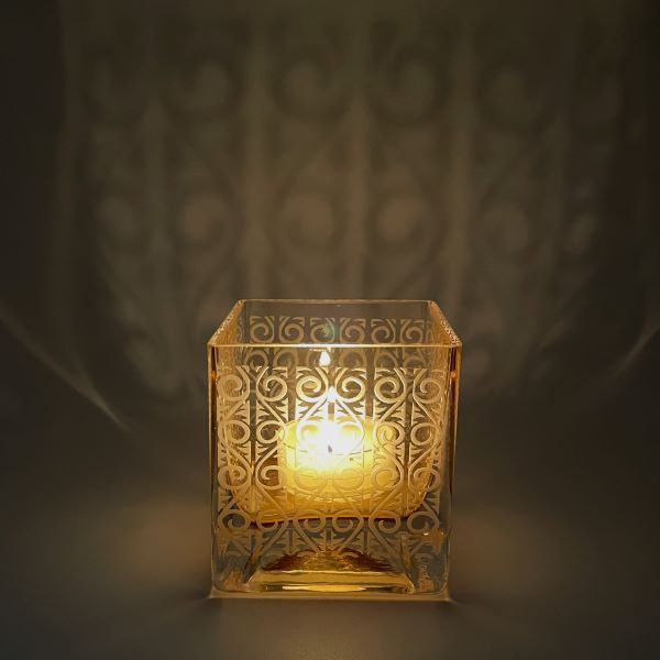 Gold Blown Square Votive with Wrought Iron#1 with lit candle and shadow Its A Blast Glass Gallery