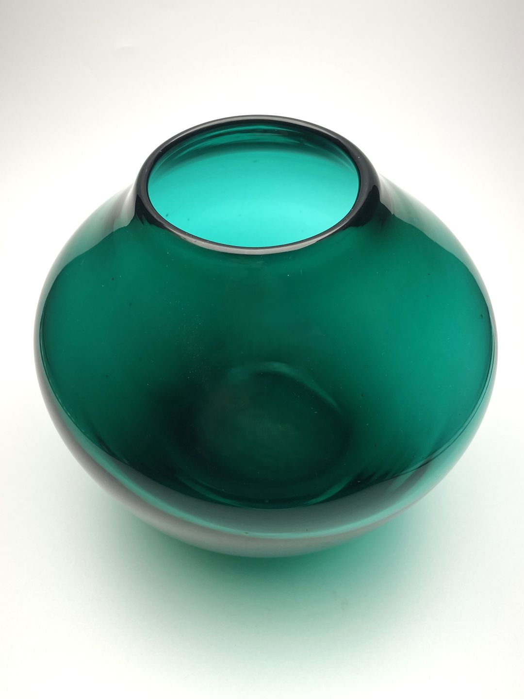 Green hand blown glass vase top view 