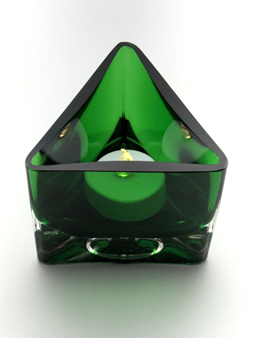 Green triangular hand blown glass candle holder top view