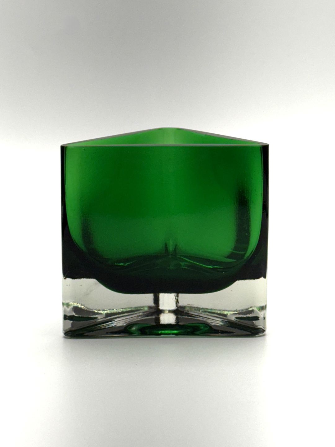 Green triangular hand blown glass candle holder side view