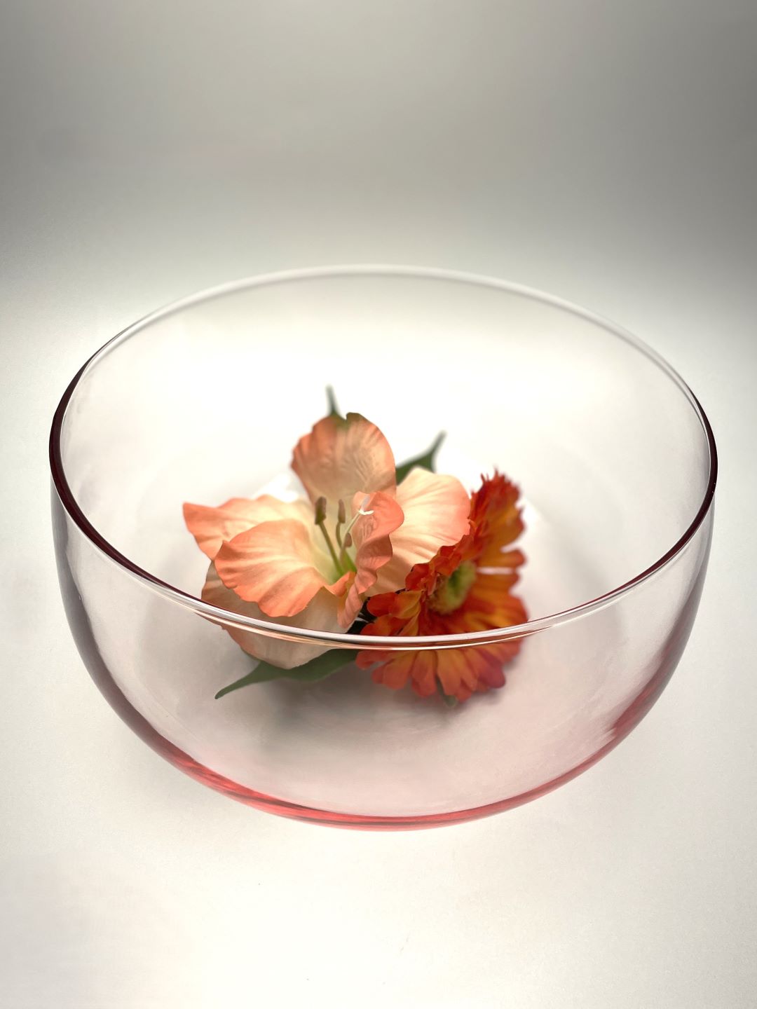 Pink Crisa glass bowl top view with flowers