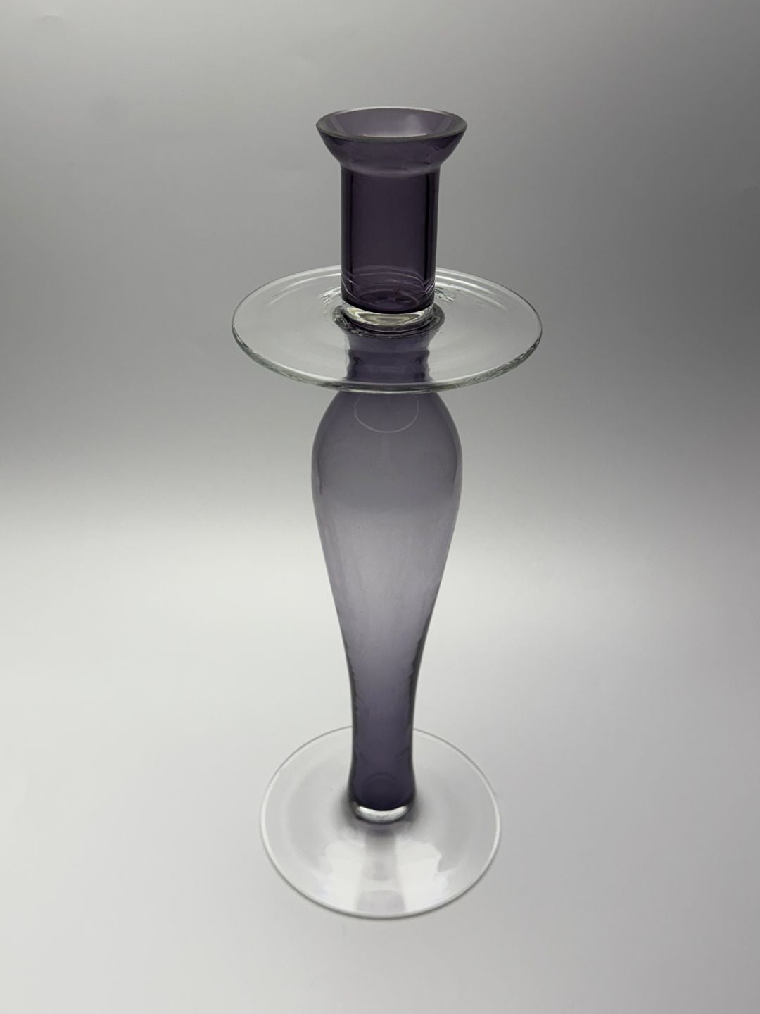 Purple tapered hand blown glass candle holder top view