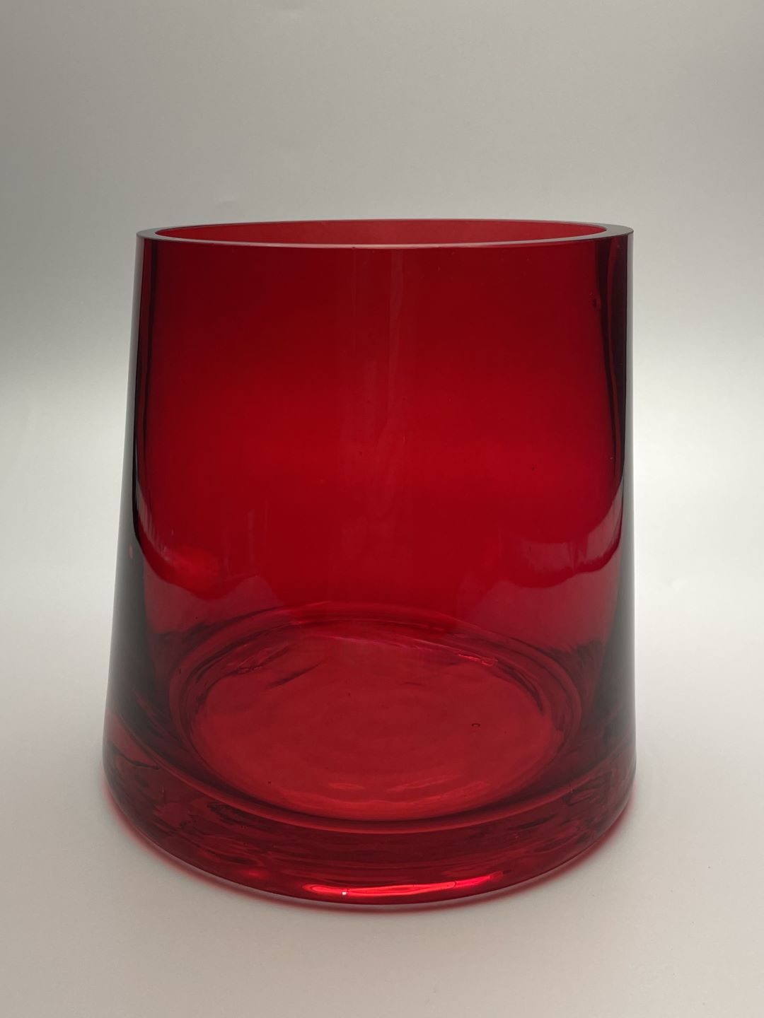 Red hand blown flared glass vase side view