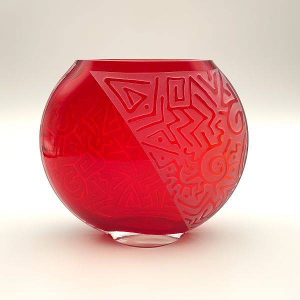 Red medium flat round glass vase with sandblasted Geo Abstract design side view 1