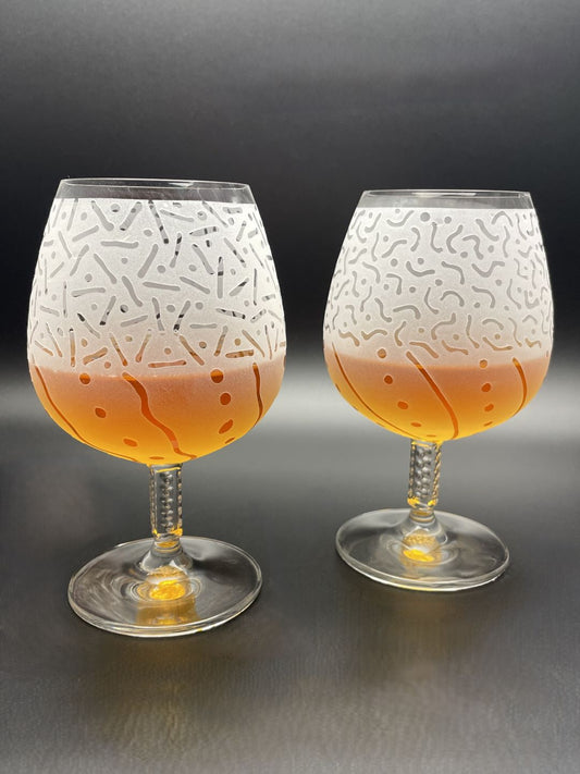 Schott Zwiesel Escapada crystal brandy glass with before and after design side view