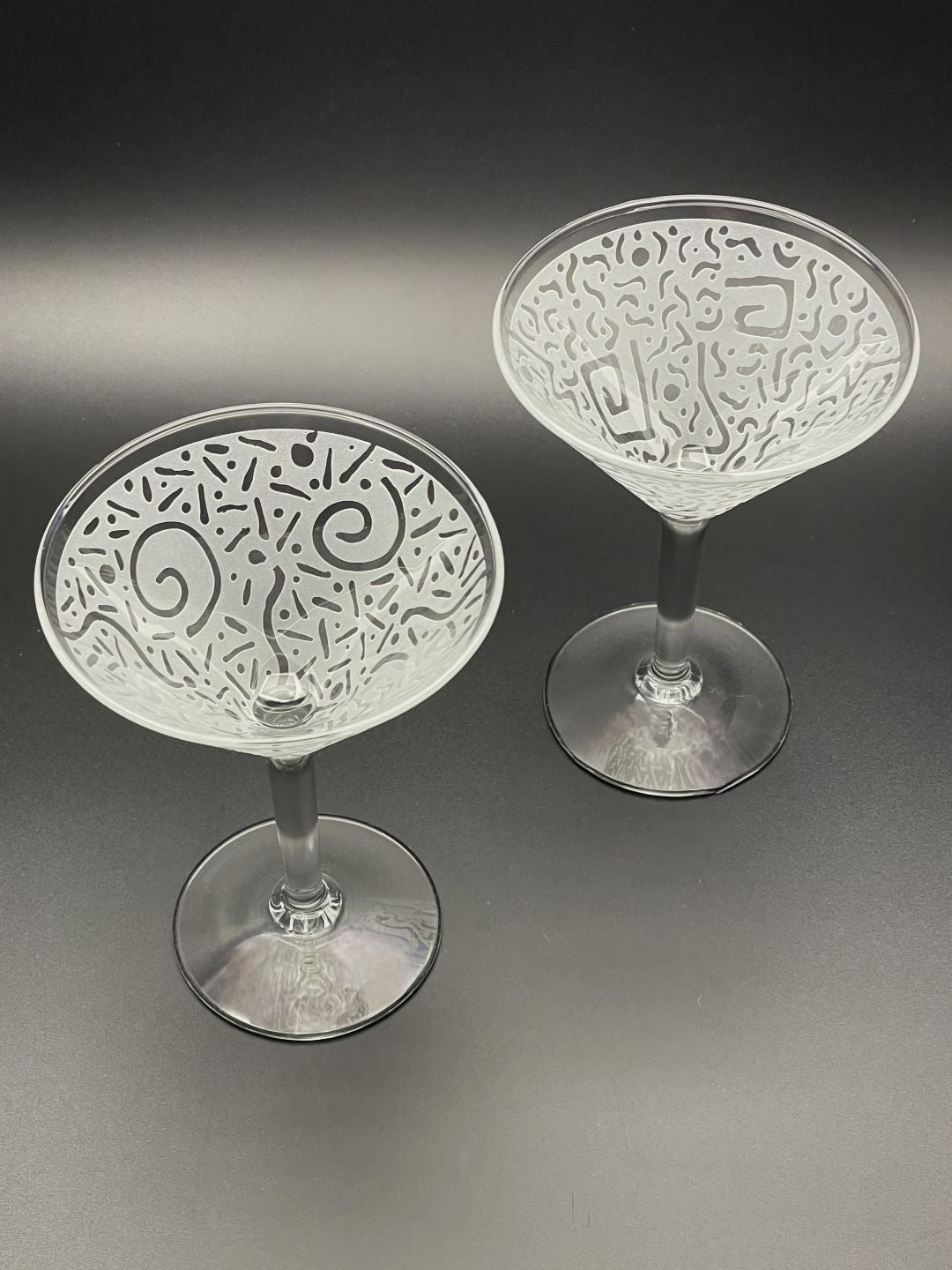 Small cocktail glasses with sandblasted Spiral and Square Millennium design top view 