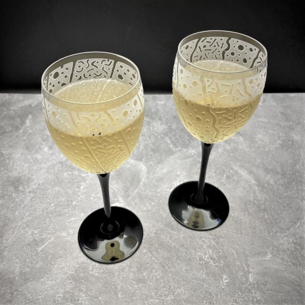 Black Stem Luminarc Domino Wine Glass Pair with White Wine and Sandblasted Designs Top View