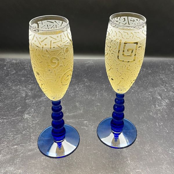 Blue Bubble Stem Champagne Glasses with Sandblasted Designs Champagne in Glass Top View