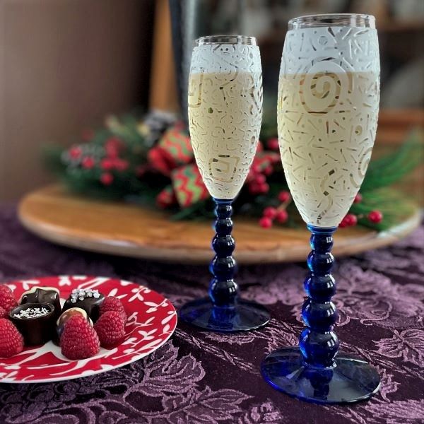 Blue Bubble Stem Champagne Glasses Sandblasted Designs Side View Champagne Chocolates Raspberries