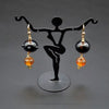 Black and Gold Glass Bead Earrings on Stand