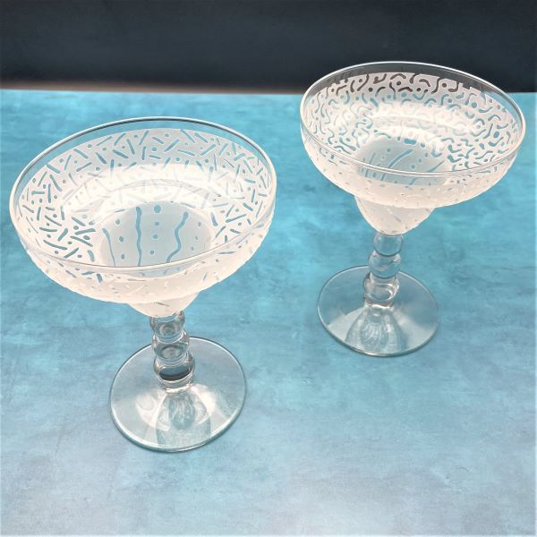 Clear-bubble-stem-margarita-glasswith-sandblasted-Before-and-After-designs-top-view