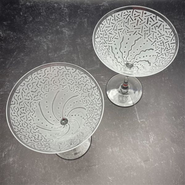 Clear-martini-cocktail-glasses-with-sandblasted-Before-and-After-whimsical-designs-top-view