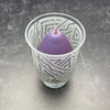 Clear-contempo-hand-blown-glass-candle-holder-with-Chama-design-top-view-with-purple-candle
