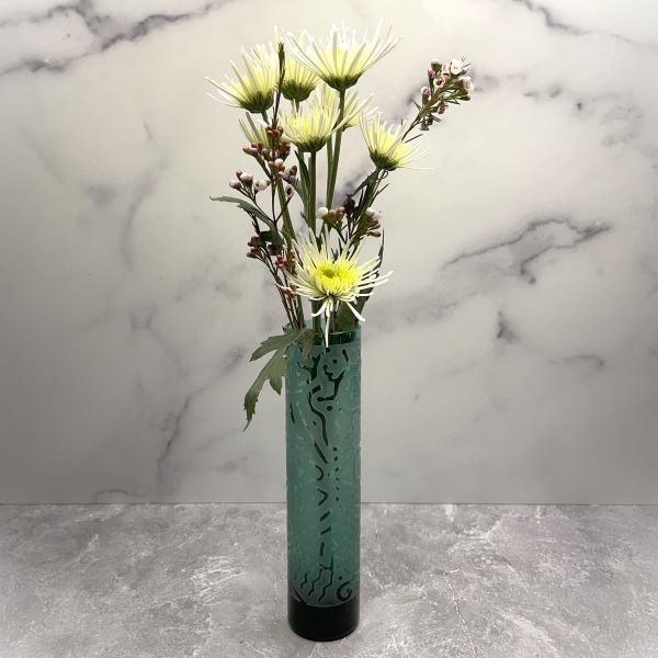    Green-glass-bud-vase-with-sandblasted-geo-abstract-design-with-flowers
