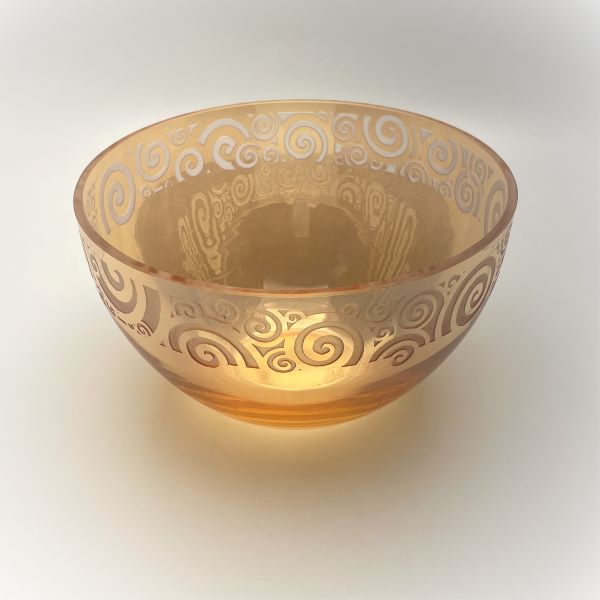    Irridescent-peach-bowl-with-spiraling-out-of-control-sandblasted-design