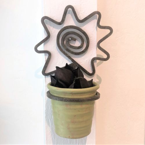Metal Wall Planter with Chartreuse Pot hanging on wall
