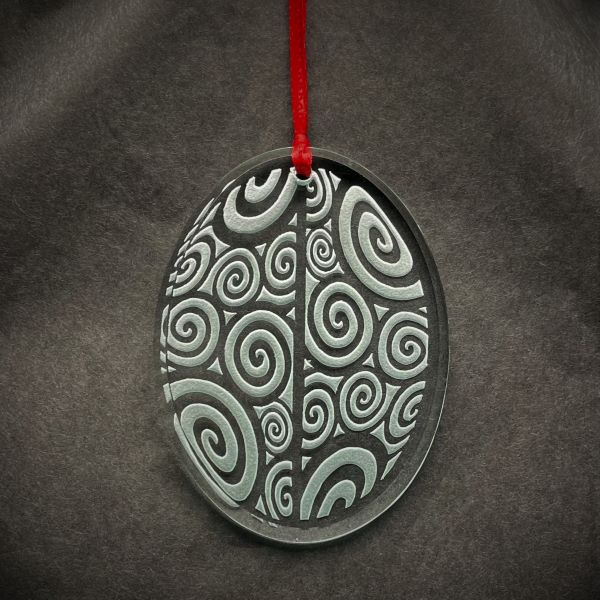 Crystal Beveled Oval Shaped Ornament with Sandblasted Spiral Design