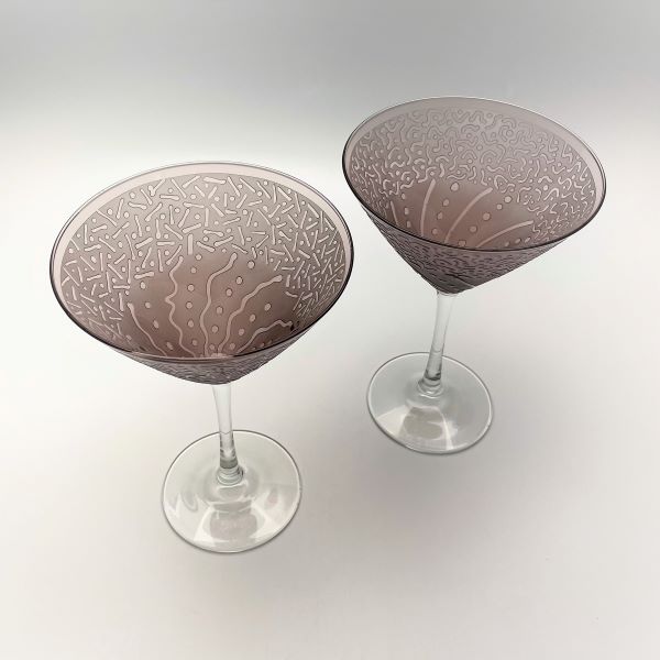 Purple-martini-cocktail-glasses-with-sandblasted-Before-and-After-whimsical-designs-top-view