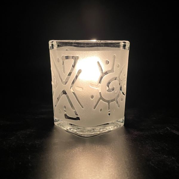 Square Shot Glass with Sandblasted Etched Geo Sun #1 Design with lit candle