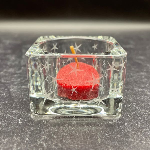 Square Glass Tealight Candle Holder with Sandblasted Star Design with red candle side view