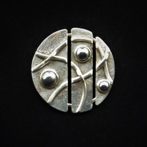 Sterling Silver Circle Pin with Hematite Stones